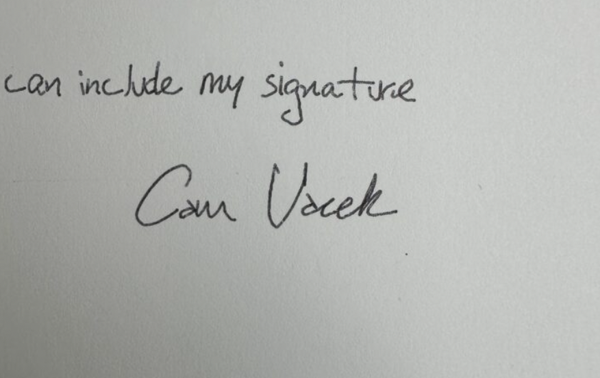 Cam Vacek's signature written on a piece of paper